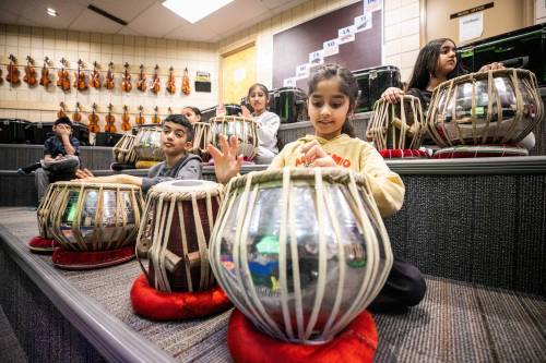 MIKAELA MACKENZIE / FREE PRESS
                                Students take part in an after-school tabla program at A.E. Wright School on Tuesday, Feb. 24, 2026. The drumming program, which is one of few in the country, launched several years ago to connect Punjabi students with a traditional instrument. For Maggie story. Free Press 2026