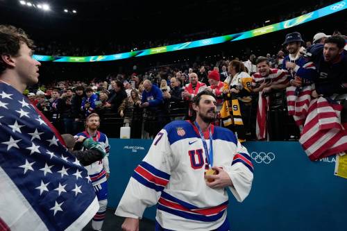AP Photo/Petr David Josek
                                United States&rsquo; Connor Hellebuyck (37) celebrates after the United States defeated Canada in a men&rsquo;s ice hockey gold medal game between Canada and the United States at the 2026 Winter Olympics, in Milan, Italy.